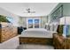 Spacious bedroom with king-size bed and large windows at 3894 Lana Ave, Davenport, FL 33897
