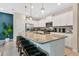 Modern kitchen with granite countertops and stainless steel appliances at 3894 Lana Ave, Davenport, FL 33897