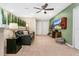 Game room with a leather couch, large TV, and arcade games at 3894 Lana Ave, Davenport, FL 33897