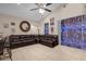 Relaxing living room featuring a sectional sofa and tile flooring at 4001 Scarlet Branch Rd, Orlando, FL 32824
