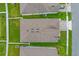 Aerial view of house and surrounding neighborhood, showcasing landscaping and backyard at 4001 Scarlet Branch Rd, Orlando, FL 32824