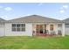 House exterior showcasing backyard and patio at 4001 Scarlet Branch Rd, Orlando, FL 32824