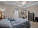 Bedroom with large bed, dresser and safe at 4001 Scarlet Branch Rd, Orlando, FL 32824