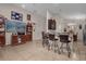 Kitchen features granite countertops, dark wood cabinets, and a breakfast bar at 4001 Scarlet Branch Rd, Orlando, FL 32824
