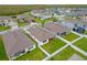 Aerial view of houses with backyard and community features at 4001 Scarlet Branch Rd, Orlando, FL 32824