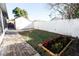 Fenced backyard with patio, garden, and storage shed at 6632 Meritmoor, Orlando, FL 32818