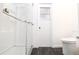 Clean bathroom featuring a toilet and walk-in shower at 6632 Meritmoor, Orlando, FL 32818