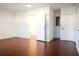 Spacious bedroom with wood-look floors and bathroom access at 6632 Meritmoor, Orlando, FL 32818