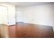 Bright bedroom with wood-look floors and access to bathroom at 6632 Meritmoor, Orlando, FL 32818