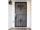 Black metal security door with a keypad lock at 6632 Meritmoor, Orlando, FL 32818