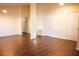 Bright and airy living room featuring laminate wood flooring at 6632 Meritmoor, Orlando, FL 32818