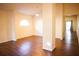 Spacious living room with wood-look flooring and neutral walls at 6632 Meritmoor, Orlando, FL 32818