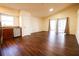 Open living room with vaulted ceiling and patio access at 6632 Meritmoor, Orlando, FL 32818