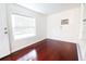Bright sunroom with hardwood floors and window at 6632 Meritmoor, Orlando, FL 32818