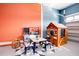 Playroom features a play kitchen and playhouse at 7736 Graben St, Kissimmee, FL 34747