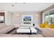 Living room with sectional sofa, coffee table, and large TV at 7736 Graben St, Kissimmee, FL 34747