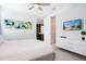 Main bedroom with TV and dresser at 7736 Graben St, Kissimmee, FL 34747