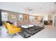 Open concept living room and kitchen with modern furniture at 7736 Graben St, Kissimmee, FL 34747