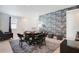 Game room with card table and comfortable seating at 7736 Graben St, Kissimmee, FL 34747
