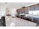 Kitchen with granite countertops and stainless steel appliances at 7736 Graben St, Kissimmee, FL 34747