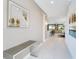 Bright entryway with view into the living room at 7736 Graben St, Kissimmee, FL 34747