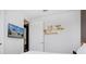 Bedroom with mounted TV and closet at 7736 Graben St, Kissimmee, FL 34747