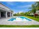Luxury home with a sizable pool and ample outdoor space at 7736 Graben St, Kissimmee, FL 34747