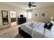 Spacious bedroom with king-size bed and ensuite bathroom access at 9030 Shadow Mountain St, Davenport, FL 33896