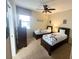 Two twin beds with Mickey Mouse bedding in a bright bedroom at 9030 Shadow Mountain St, Davenport, FL 33896