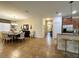 Open concept kitchen with island, granite countertops, and stainless steel appliances at 9030 Shadow Mountain St, Davenport, FL 33896