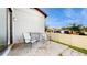 Cozy patio with seating and a built-in grill at 9195 Chandler Dr, Groveland, FL 34736
