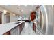 Modern kitchen with stainless steel appliances and wine cooler at 9195 Chandler Dr, Groveland, FL 34736