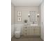 Light and bright bathroom with single vanity and toilet at 1751 Glencoe Rd, Winter Park, FL 32789