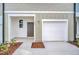 Attached garage with a private entrance at 246 Mandovi St, Davenport, FL 33837