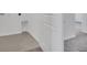 Laundry room with tile floor and access to other rooms at 246 Mandovi St, Davenport, FL 33837