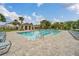 Inviting community pool with a covered patio area at 246 Mandovi St, Davenport, FL 33837