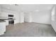 Modern kitchen with white cabinets and stainless steel appliances at 246 Mandovi St, Davenport, FL 33837