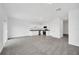 Modern kitchen with white cabinets and stainless steel appliances at 246 Mandovi St, Davenport, FL 33837