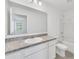 Bathroom with vanity, toilet and tub shower combo at 246 Mandovi St, Davenport, FL 33837