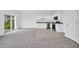 Modern kitchen with white cabinets and stainless steel appliances at 246 Mandovi St, Davenport, FL 33837