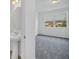 Bright bedroom with neutral carpet and large windows at 246 Mandovi St, Davenport, FL 33837