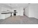 Modern kitchen with white cabinets and stainless steel appliances at 246 Mandovi St, Davenport, FL 33837
