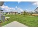 Spacious backyard with grassy area and a patio at 246 Mandovi St, Davenport, FL 33837