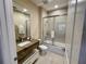 Clean bathroom with granite vanity and bathtub at 3131 Brasilia Ave, Kissimmee, FL 34747