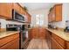 Well-equipped kitchen boasting stainless steel appliances and ample counter space at 3520 Calabria Ave # 3520, Davenport, FL 33897