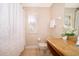 Inviting bathroom featuring a vanity with granite countertop and shower at 3520 Calabria Ave # 3520, Davenport, FL 33897