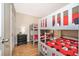 Bedroom with two sets of bunk beds, wood floors, and Mickey Mouse bedding at 3520 Calabria Ave # 3520, Davenport, FL 33897