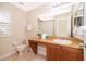 Clean bathroom with single sink vanity, shower/tub combo, and toilet at 3520 Calabria Ave # 3520, Davenport, FL 33897