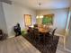 Formal dining room with a wooden table and chairs at 6462 Cantua Ln # 105, Orlando, FL 32835