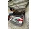 Garage with car and storage space at 6462 Cantua Ln # 105, Orlando, FL 32835